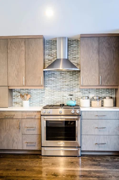 Spotless kitchen cleaned by Precious — gleaming counters and polished appliances